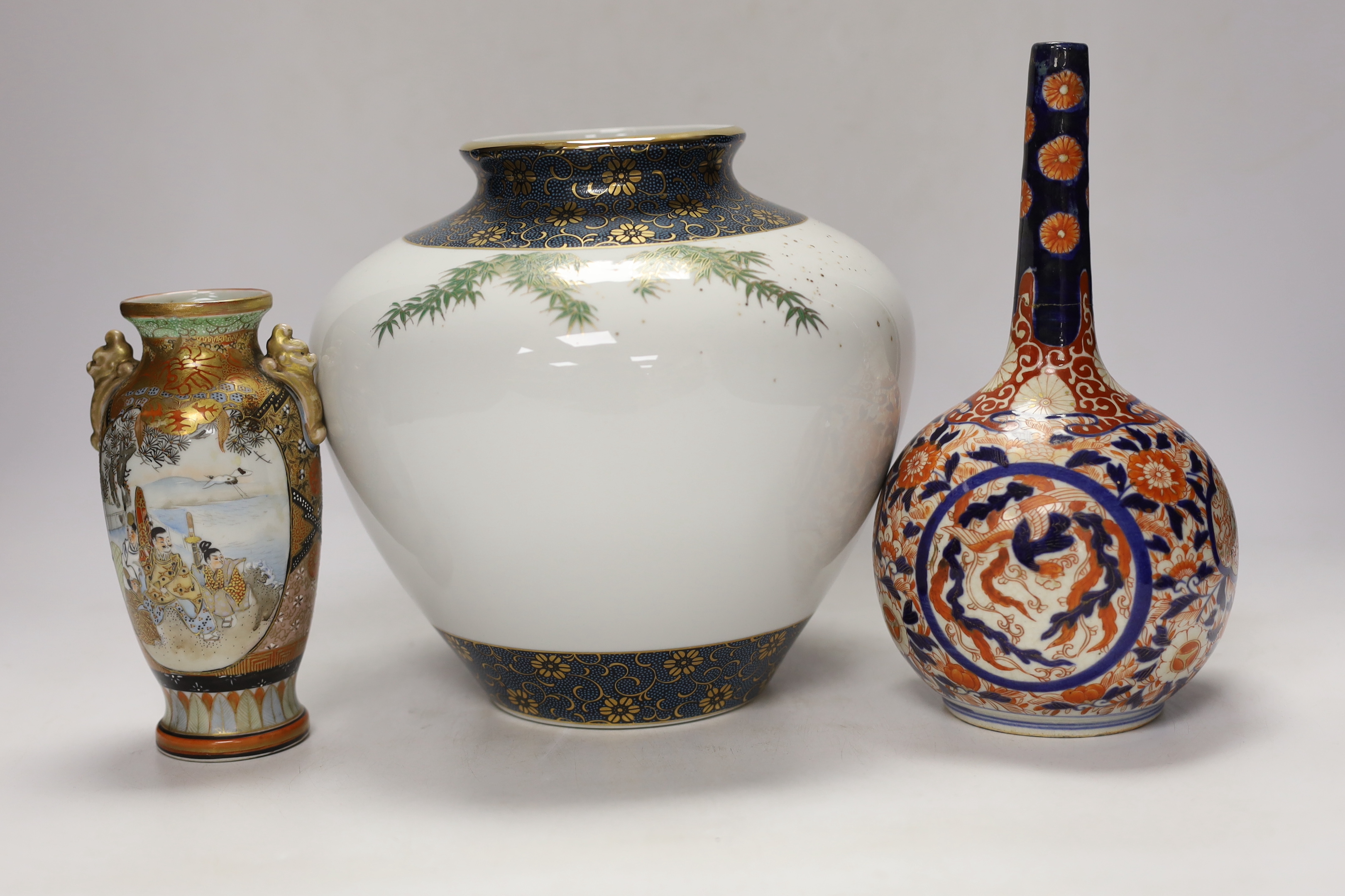 Japanese ceramics including an Imari bottle vase, a Satsuma vase and Kutani eggshell porcelain, tallest 22cm (8)